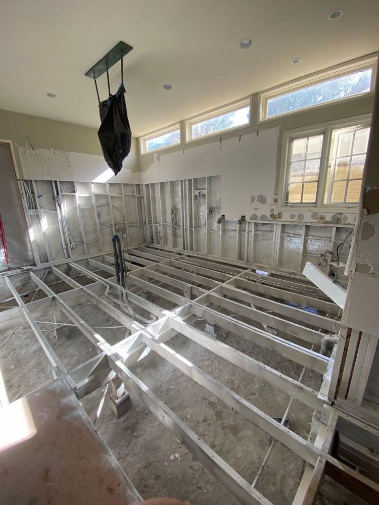 Same room after cleaning, drying and sealing of the exposed framing